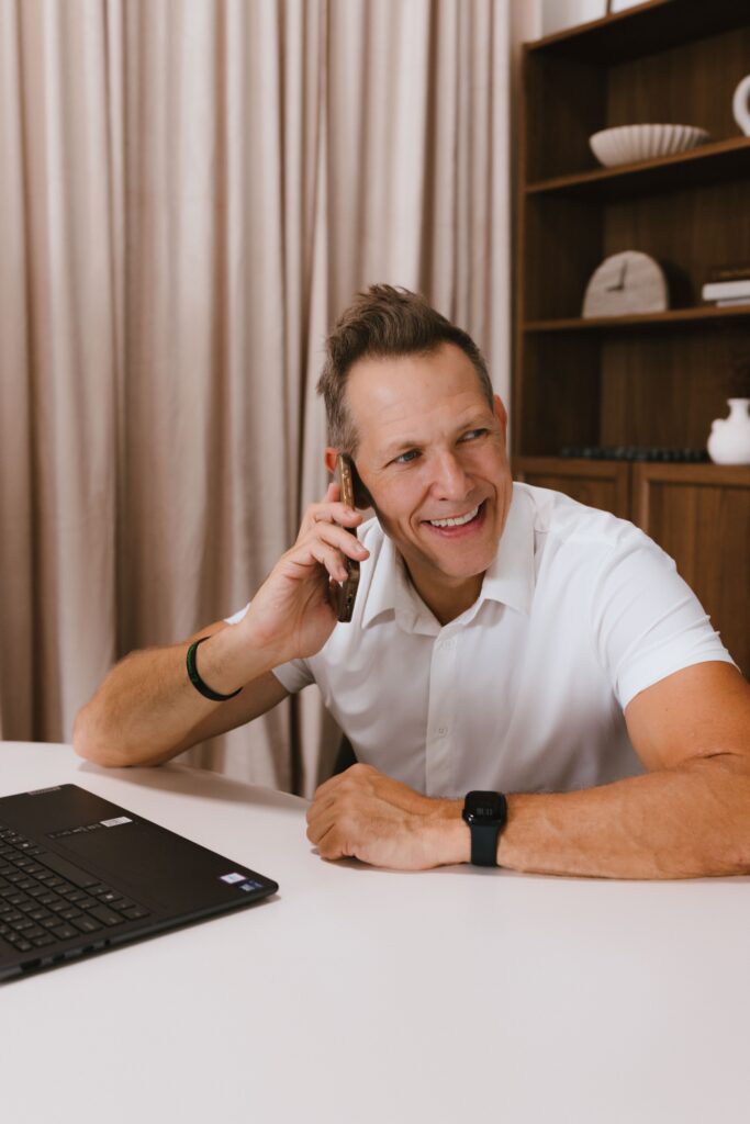 Dan on the phone with a seller